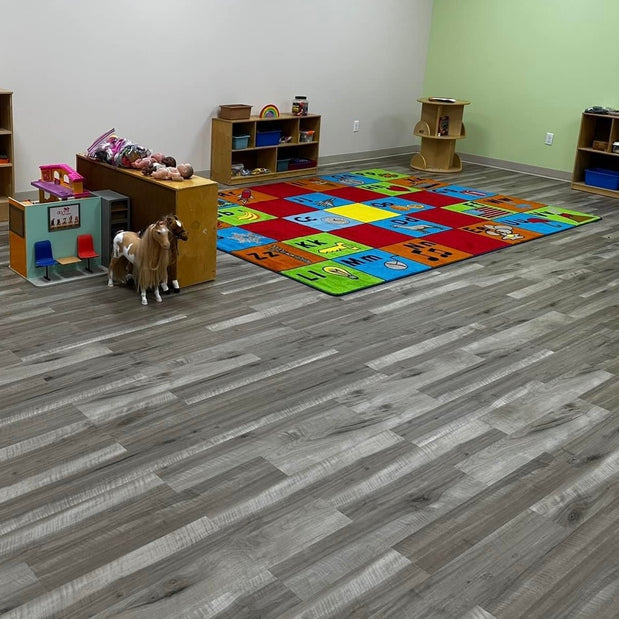 Light LVP flooring installed in a Milwaukee-area retail store