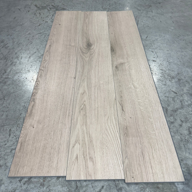 Mohawk LVP Flooring 941 - 5MM - Three planks fanned showing warm sandy beige oak grain