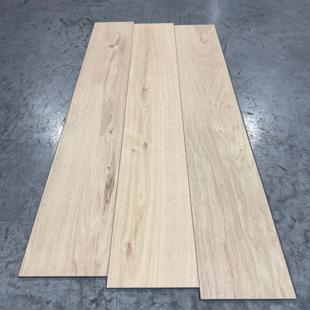 Mohawk LVP Flooring 201 - 5MM - Three planks fanned showing light cream blonde white oak grain
