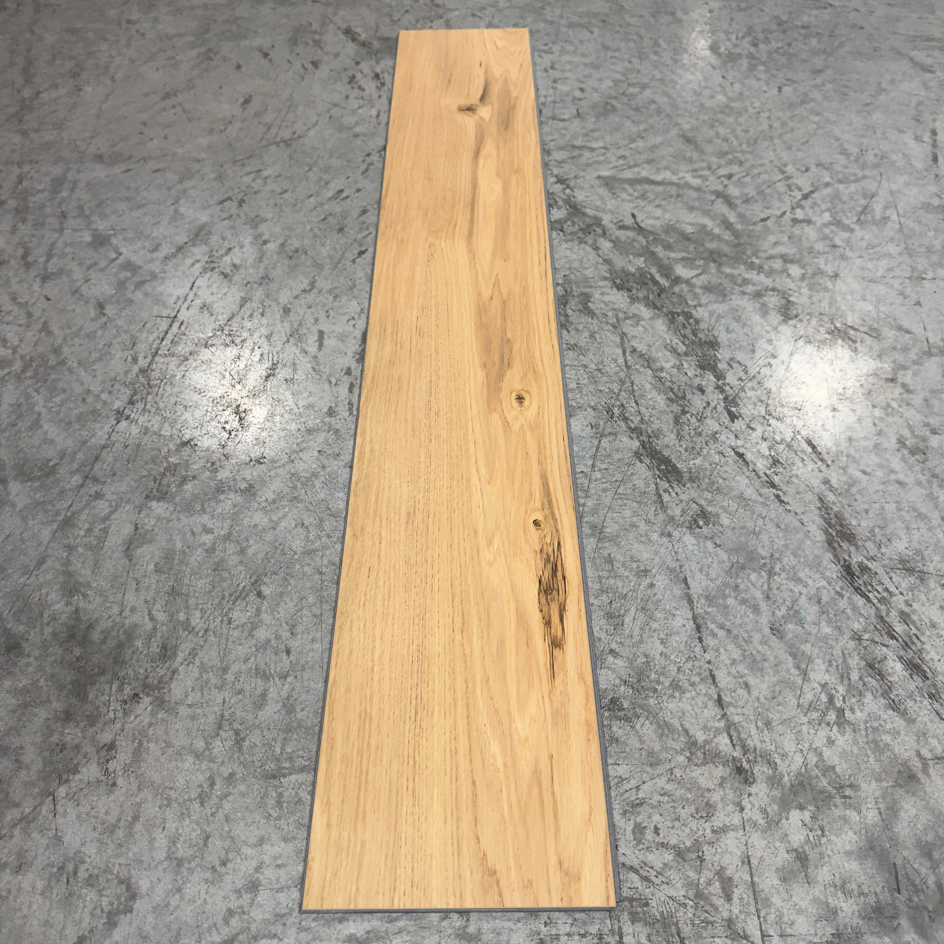 Mohawk LVP Flooring 567 - 5MM - Single plank showing full length with open grain pores and dark mineral-filled knot detail