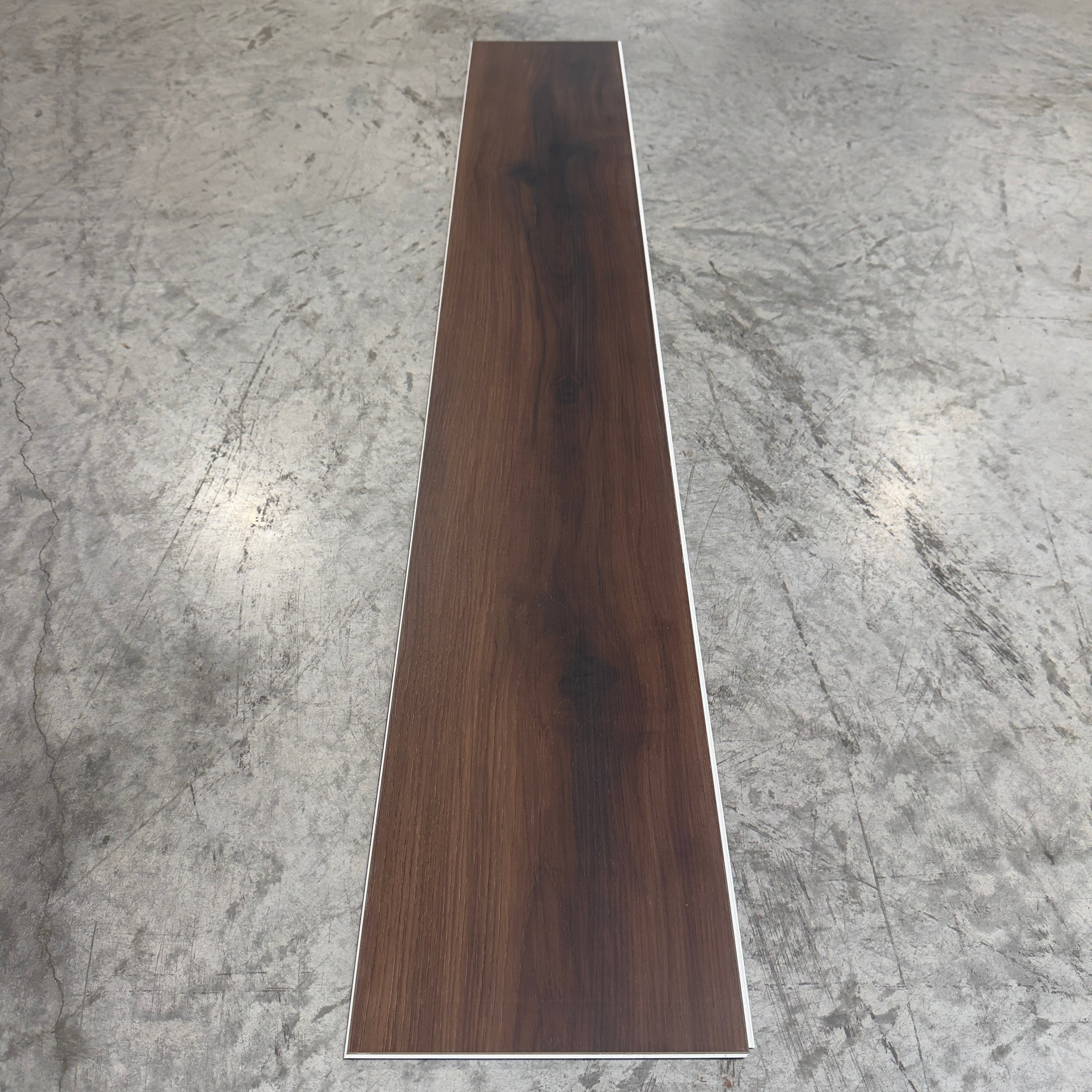 Toucan SPC Flooring 501 - 6MM - Single plank showing full length deep dark brown walnut finish with fine grain texture