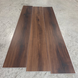 Toucan SPC Flooring 501 - 6MM - Three planks showing deep espresso-walnut grain with dark knots and straight grain lines