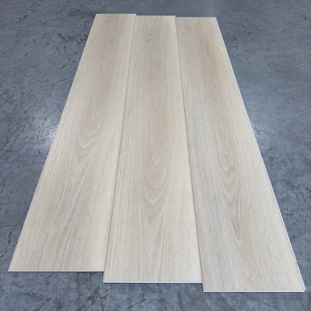 Toucan SPC Flooring 512 - 6MM - Three planks showing soft whitewashed linen oak grain with fine flowing figure